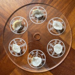 6 geodes with clear quartz crystals on the Urusak Water Device main plate
